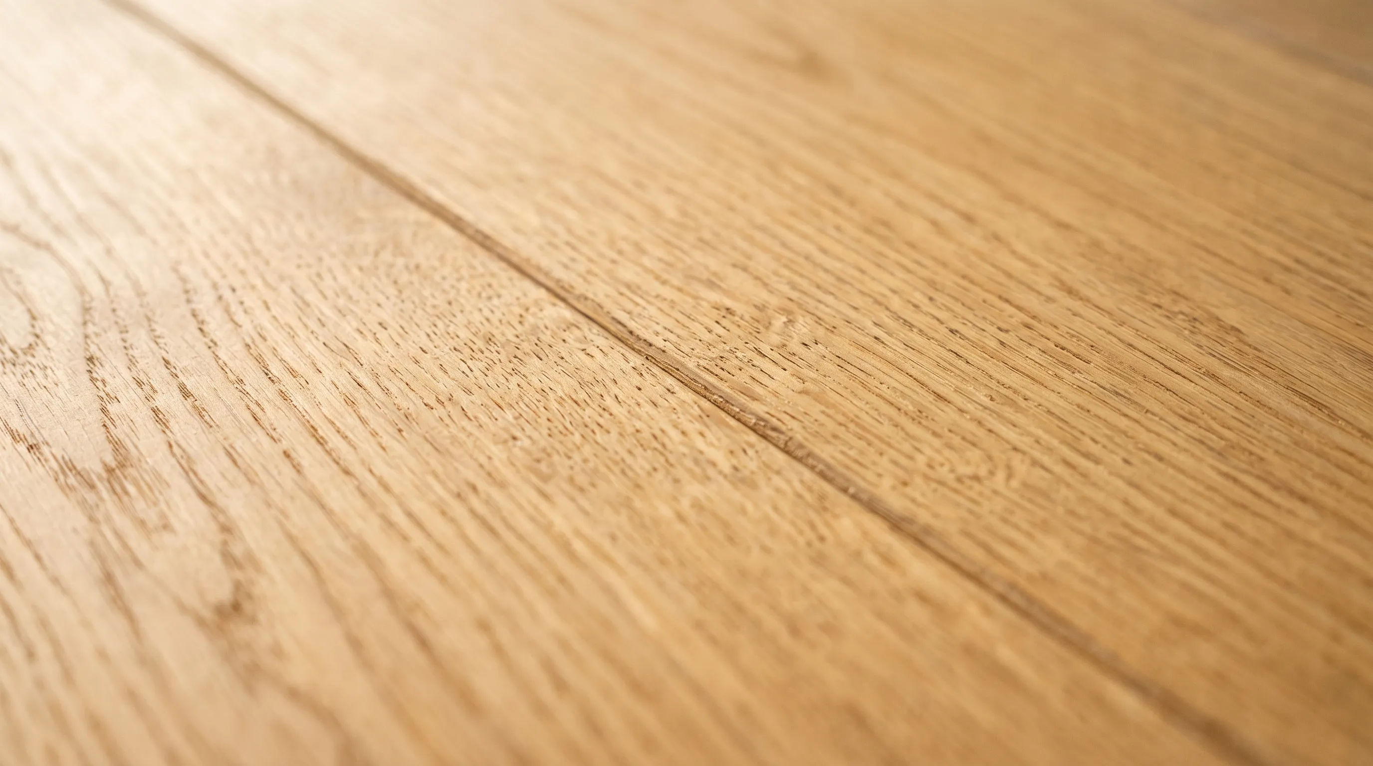 Macro photograph of blond white oak flooring showing open grain